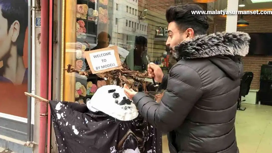 Berber müşteri bulamayınca kardan adamı tıraş etti