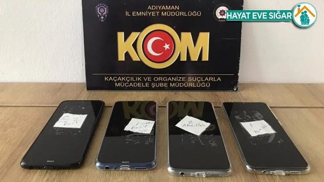 Kaçak cep telefonları ve nargile tütünü ele geçirildi