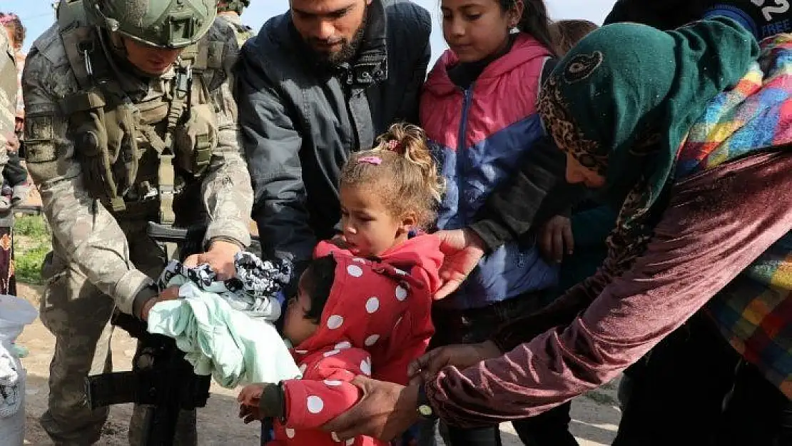 MSB:' Tel Abyad'da 2-10 yaş arası çocuklara kıyafet yardımı yapıldı.'