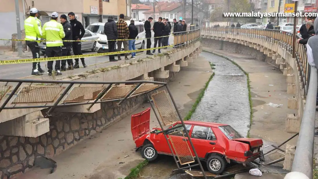 Otomobille dereye uçan sürücü burnu bile kanamadan kurtuldu