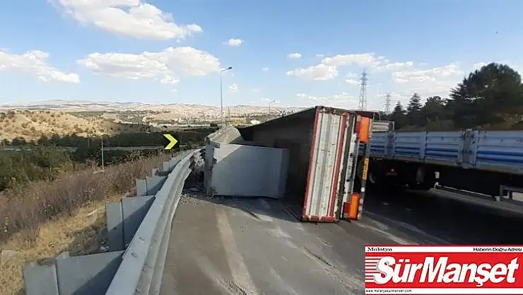 Beton kirişleri taşıyan tır devrildi, sürücü yaralandı