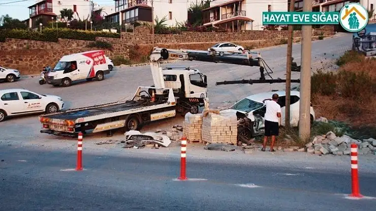 Freni boşalan vinç otomobili ezdi, şarampole uçtu