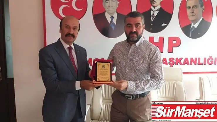 Kamu-Sen'den MHP'ye teşekkür plaketi