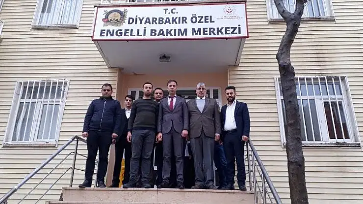 MHP'den bakımevindeki yaşlılara ziyaret