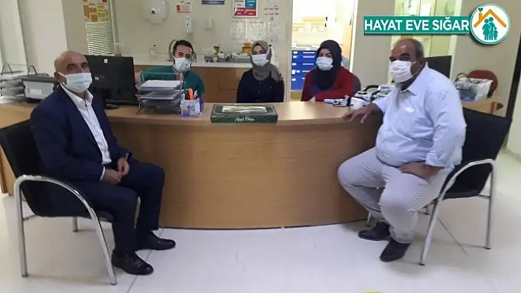 Muhtarlardan anlamlı ziyaret