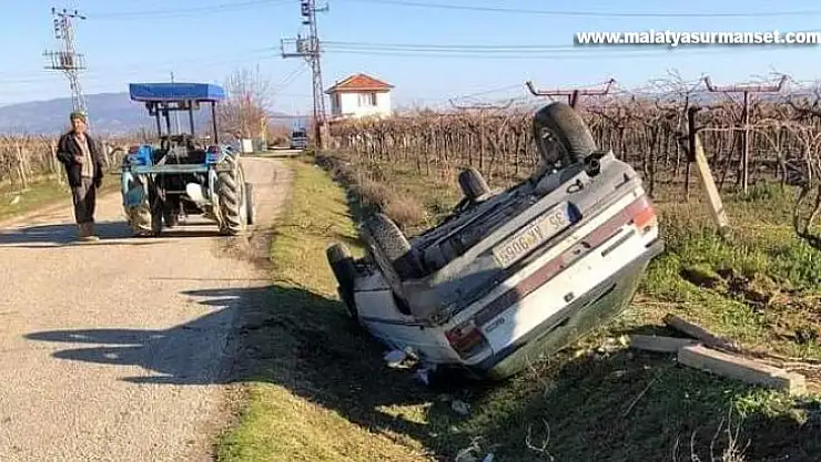 Takla atan araçtan sağ kurtuldu