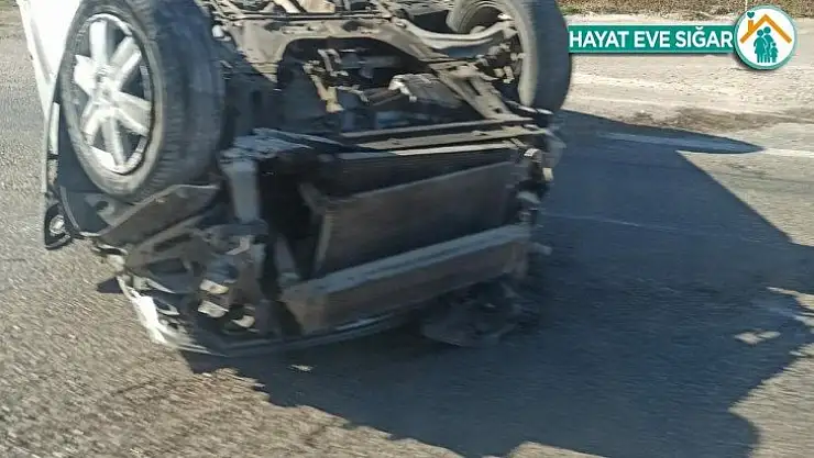 Takla atan otomobilden hafif yaralı kurtuldu